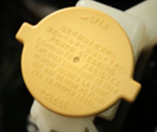 checking fluids power steering fluid | Doral Subaru in Doral FL